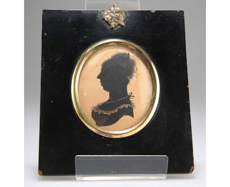 LATE 18TH/EARLY 19TH CENTURY PORTRAIT SILHOUETTE OF A LADY Watercolour with white  7.5cm x 6cm
