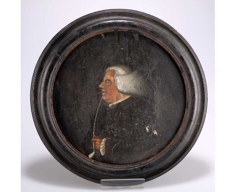 18TH CENTURY ENGLISH SCHOOL PORTRAIT OF A GENTLEMAN SMOKING A CLAY PIPE Oil on circular panel  Diameter 21cm