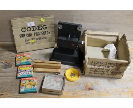 A BOXED CODED 8MM BATTERY OPERATED CINE PROJECTOR &amp; FILMS