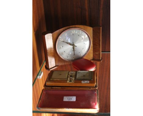 A DECO STYLE WESTCLOX MANTLE CLOCK TOGETHER WITH A CASED ESTYMA RADIO ALARM CLOCK AND A SMALL TRAVEL CLOCK (3)