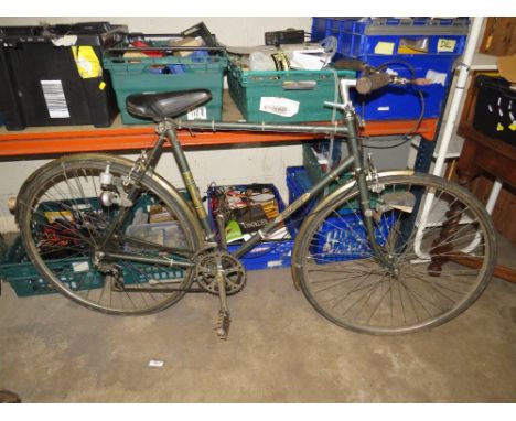 A VINTAGE RALEIGH BICYCLE WITH BROOKS CR3 SEAT