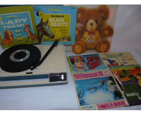 Denon battery operated record player with a qty of records and record books