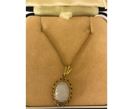 A 9ct opal pendant on 9ct chain