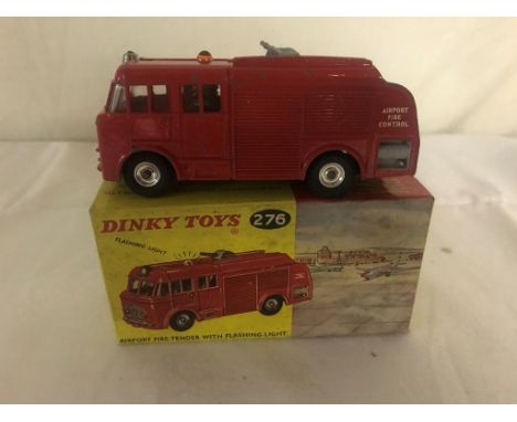 A boxed Dinky No 276 airport fire-tender with flashing light. (Some minor paint loss)