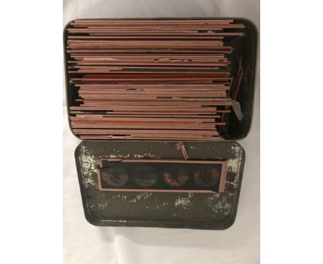 A tin of magic lantern slides