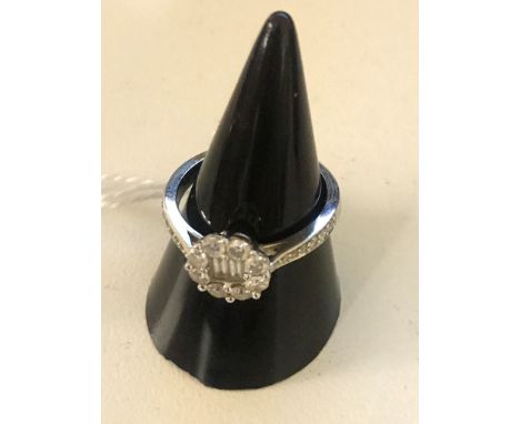 An 18ct diamond cluster ring