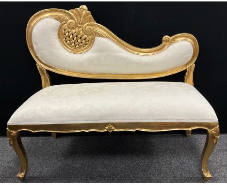 A contemporary ‘Baroque’ style upholstered settle / sofa, 111cm high x 129cm wide.