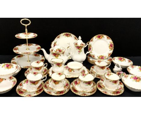 Royal Albert Old Country Roses tea service, etc, comprising - a picnic plate, a tea pot, coffee pot, three tier cake stand, s