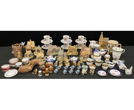 Wade and Beswick miniature animal models;  miniature tea set, Lilliput Lane models, etc.
