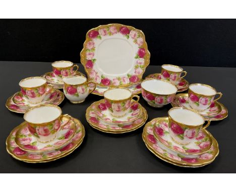 Royal Albert Crown China floral tea service for six comprised of; two picnic plates, sugar bowl, milk jugs, ten tea plates, s