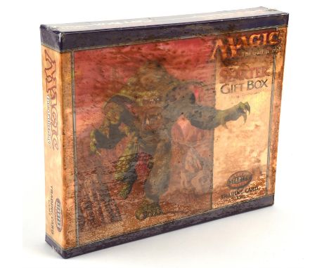 Magic The Gathering TCG. Magic The Gathering Starter Gift Box. The box still has its seal but the seal has broken at the back