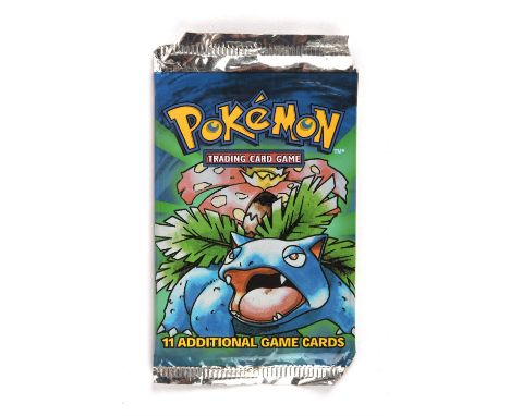 Pokemon TCG.  Opened Base Set Booster Pack, Venusaur Artwork. There are 10 cards within the opened pack all common, uncommon 