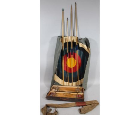 An early 20thC arrow set, in case, containing a quantity of various feathered and wooden arrows in varying banded colours, a 