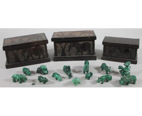 An African poker work casket, the lid decorated with giraffe, another, similar, 11cm high, 19cm wide, 10cm deep, and a furthe