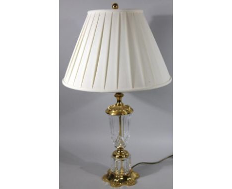 A 20thC brass and glass table lamp, 73cm high.