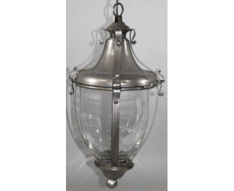 A chrome finish metal cased lantern, with glass shade with upper hanger, of modern construction, 53cm high.