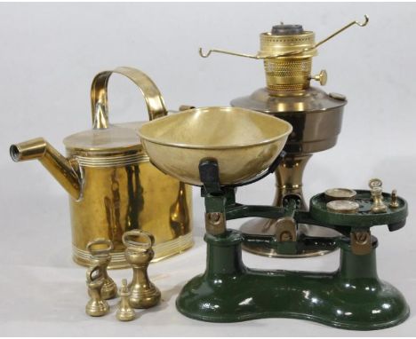 Various metalware, comprising table scales with brass pan, 22cm high, oil lamp and watering can. (a quantity)