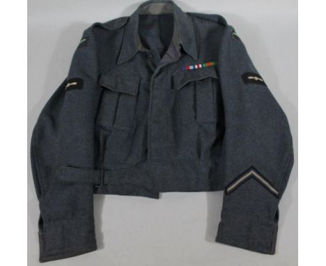 An RAF woollen three quarter length tunic jacket, with coloured bar and patch badges, size unknown.