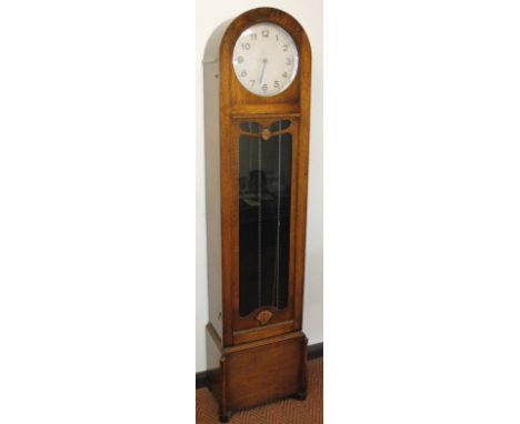 A 1930's oak longcase clock, 188cm high, 42cm wide, 25cm deep.