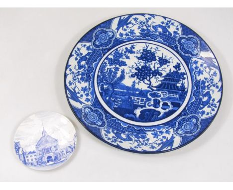 A large Wood & Sons Shan Tung charger, transfer printed with oriental scences, 42cm dia. and a Poole saucer. (2)