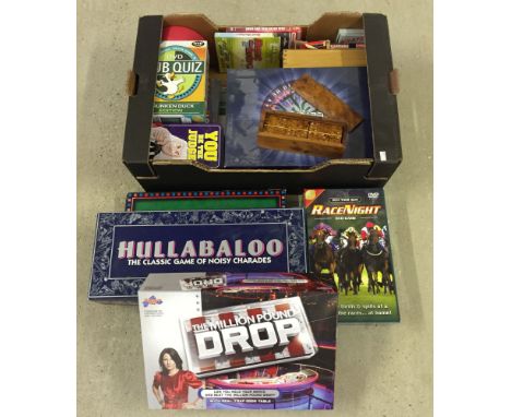 A box of toys & games to inlcude walnut & mother of pearl dominoes.