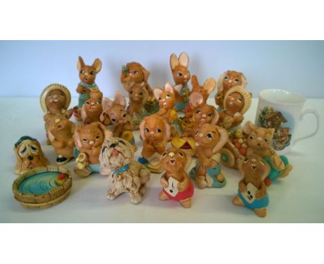 A box of 22 old Pendelfin figures together with a ceramic mug.