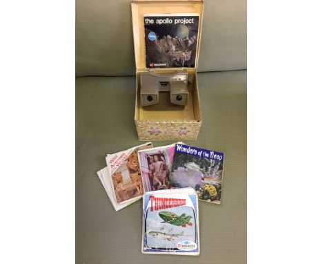 A vintage viewmaster and reels to include 'The Apollo Space Project (1964) & Thunderbirds.
