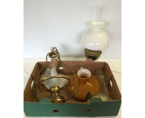 Two oil lamp style lights, one with ceiling fixtures, together with two glass lightshades.