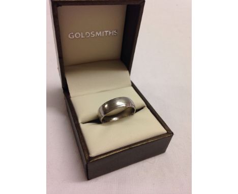 Hallmarked platinum wedding band, size R.  Weight approx 4.3g.