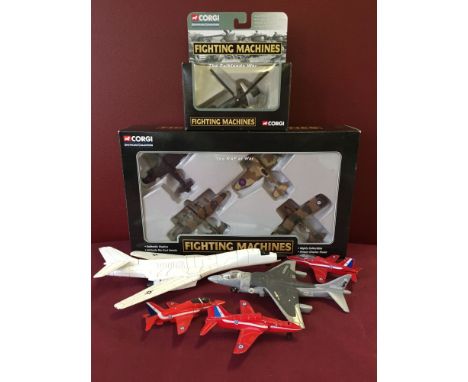 A collection of toy model aircraft to include a boxed set of Corgi Fighting Machines.