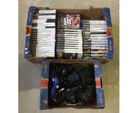 An unboxed PS2 Slim console together with 2 controllers, 2 memory cards, Eye Toy camera, Namco gun controller, power & video 