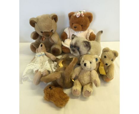 A collection of soft toys to include a Steiff 'Floppy Hausi' rabbit.