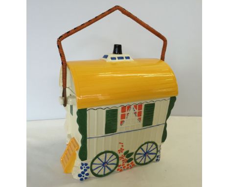 A ceramic Gypsey caravan biscuit barrel (approx 27cm wide x 28cm high).