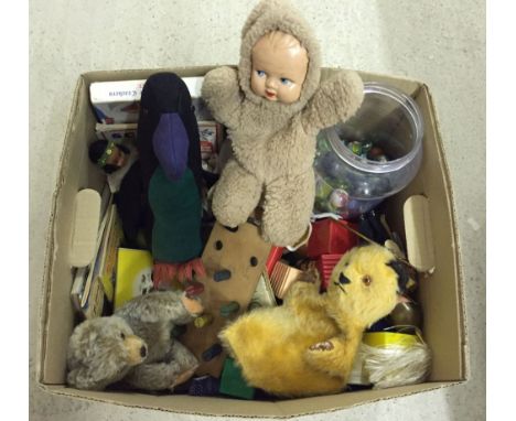 A box of vintage toys, books, teddies and a large jar of marbles.