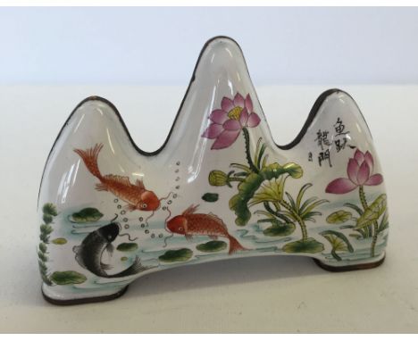 A Canton enamel brush rest with goldfish design (approx 10cm wide x 7cm high).
