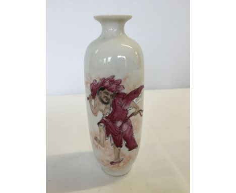Small Chinese ceramic vase with dancing man design (approx 15cm high).