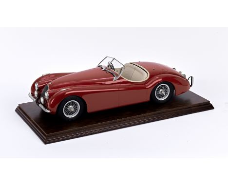 A fine 1:8 scale model Jaguar XK 120 by Neville Smith, dated FEB 99,kerbside model, signed and dated by the model maker to th