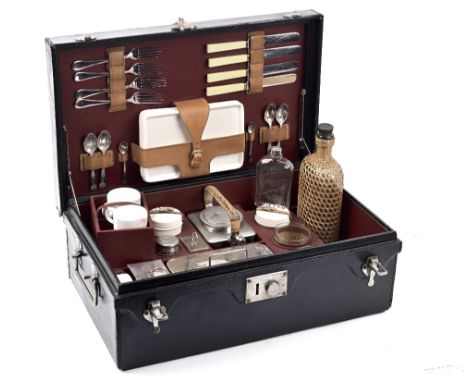 A cased picnic set for four persons, by Barrett &amp; Sons of Piccadilly, circa 1920,black Rexine case with nickelled handles