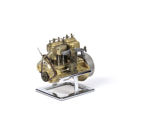 A 1:15 scale model of a circa 1911 Russo Baltique engine, by Gerald Wingrove,finely detailed, mounted on a polished metal dis