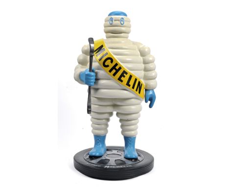 A hand-painted 'Mr Bibendum' standing forecourt display figure,modern, fibreglass construction, depicting the Michelin advert