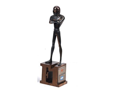 A 1980 Autosprint 'Casco di Bronzo' ('Bronze Helmet') driver's award, presented to Carlos Reutemann,the cast bronze stylised 