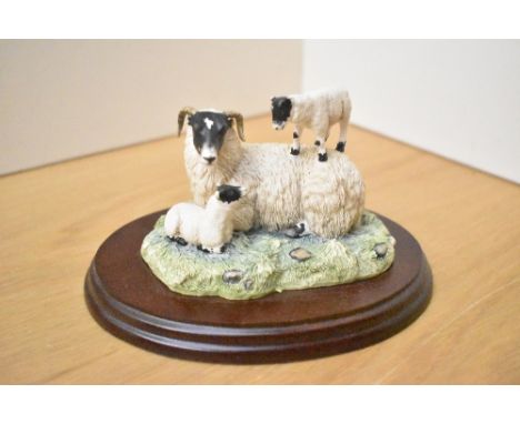 A Border Fine Arts figure group 'King of the Castle' model number JH37, signed D.Walton, complete with box.