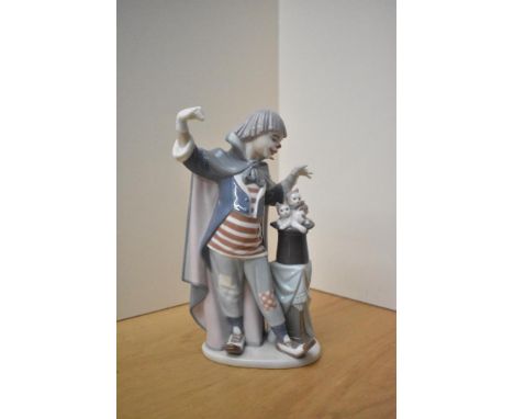 A large Lladro porcelain figure group 'Circus Magic' model number 5892, measures 28cm.