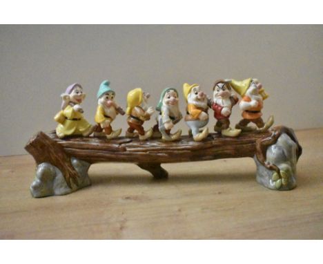 A Royal Doulton bone china limited edition Disney Showcase Collection Snow White figure group 'Heigh Ho' model number SW 31, 