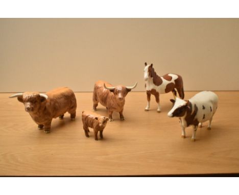 A group of five Beswick Pottery animal studies to include a Pinto Skewbald Pony model number 1373 designed by Arthur Gredingt