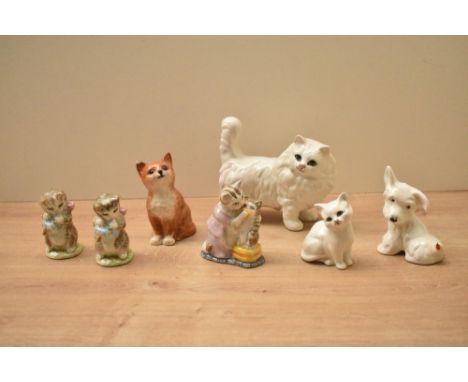 A group of three Beswick Pottery Beatrix Potter studies comprising 'Tabitha Twitchpit and Miss Moppet', 'Miss Moppet' x 2 sol