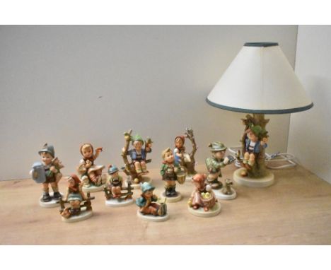 A group of eleven vintage Goebel porcelain figures/figurines including 'Good Hunting' model number 307 with crack to base, 'F