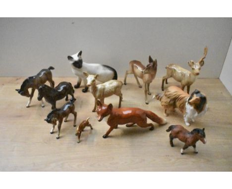 A large selection of Beswick Pottery and similar animal studies including 'Fox (Standing)' model number 1016A by Arthur Gredi