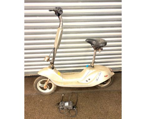 Vintage ride on scooter, with charger and key. Untested. 