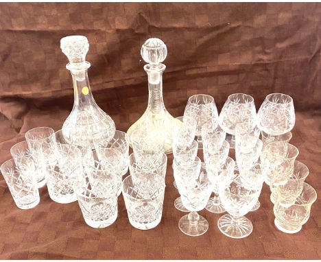Large selection of vintage and later cut glass glassware includes decanters, vases etc 